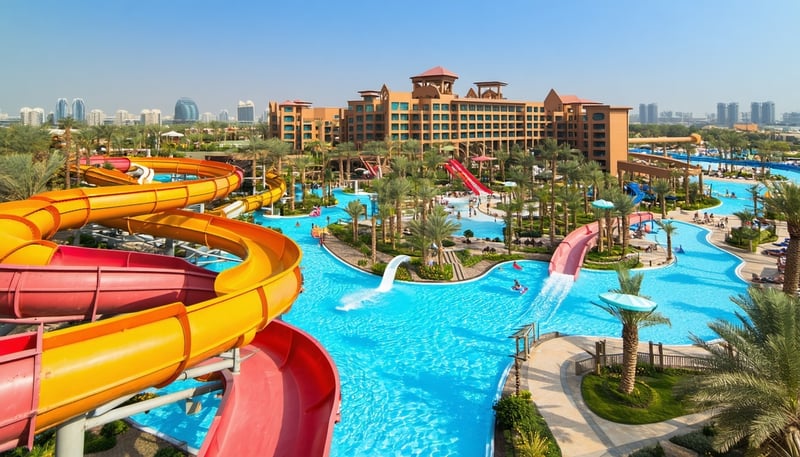 Aerial view of Aquaventure World Dubai with water slides and pools Aerial view of Aquaventure World Dubai with water slides and pools